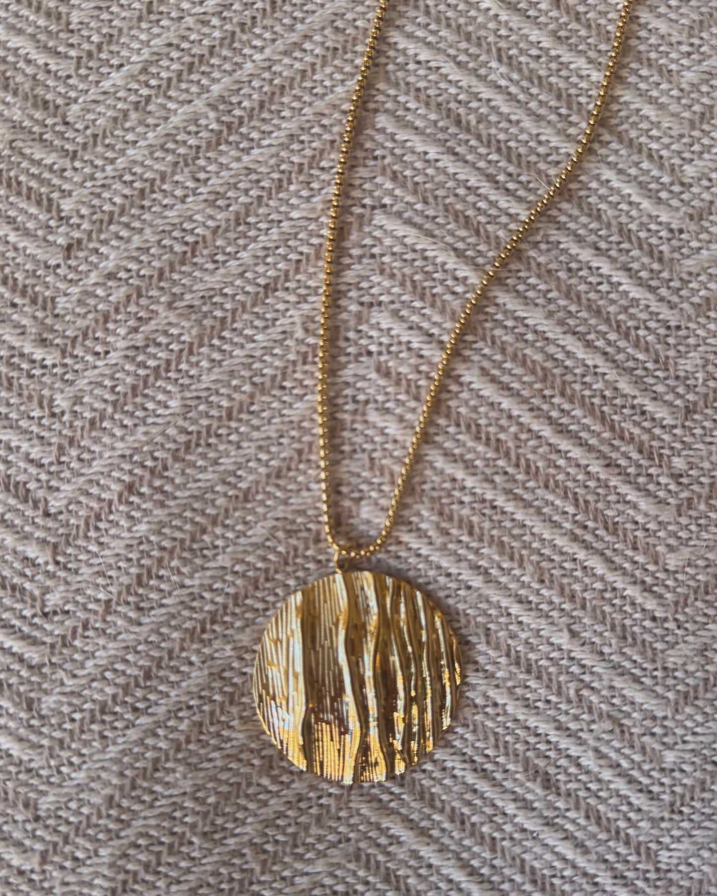 Colgante medalla acero