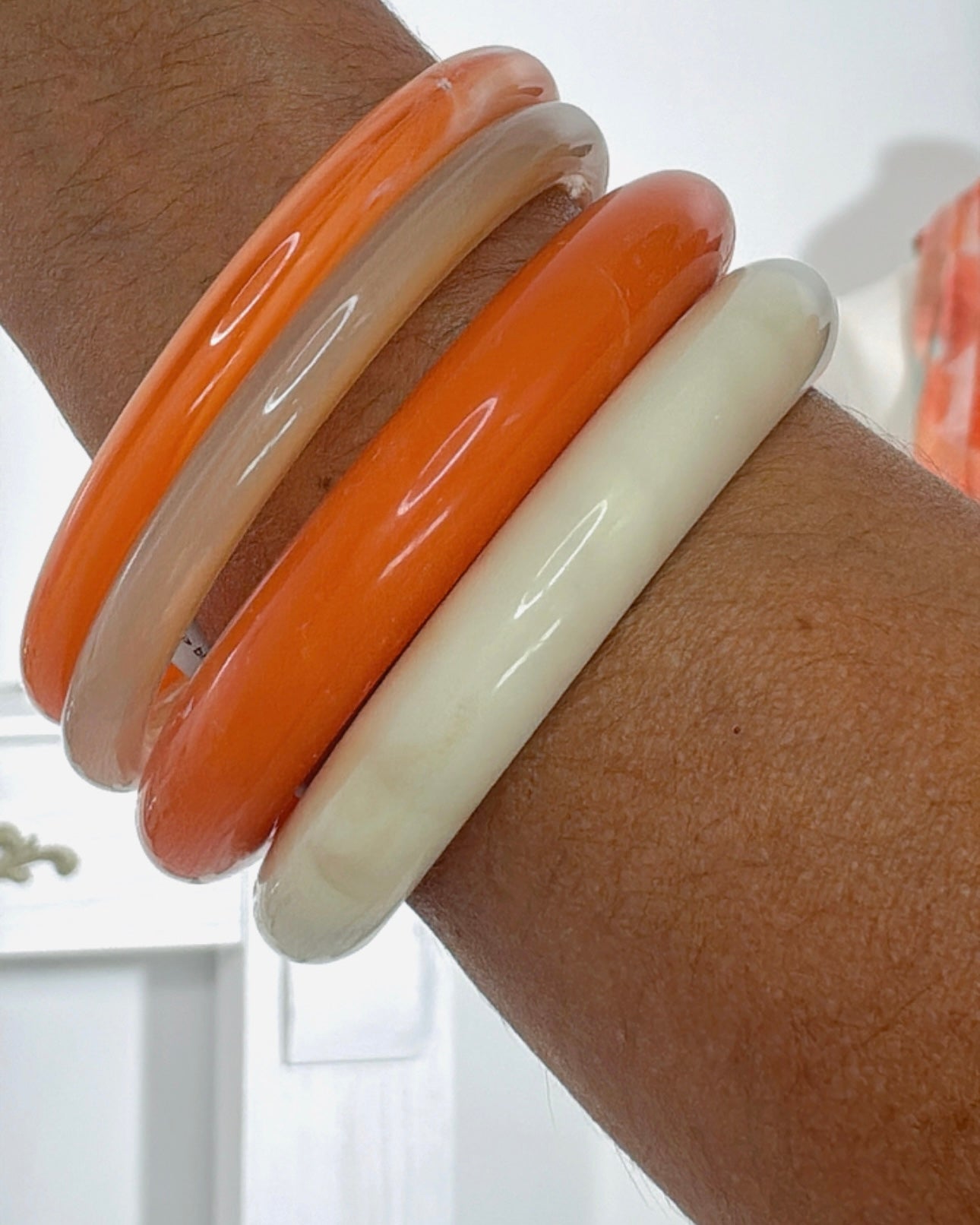 Juego pulseras acrilico orange