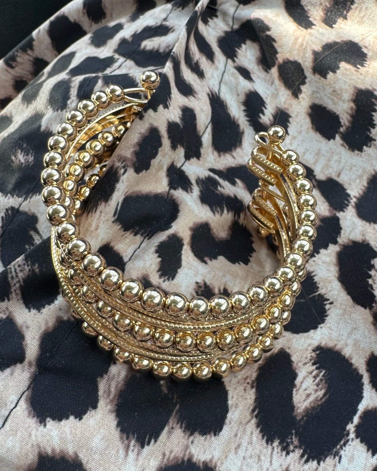 Brazalete rigido bolas