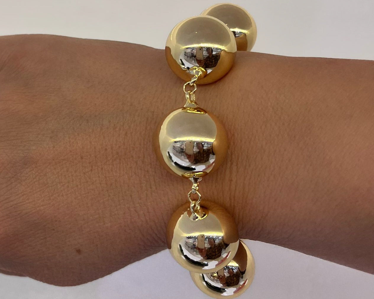 Pulsera bolas doradas