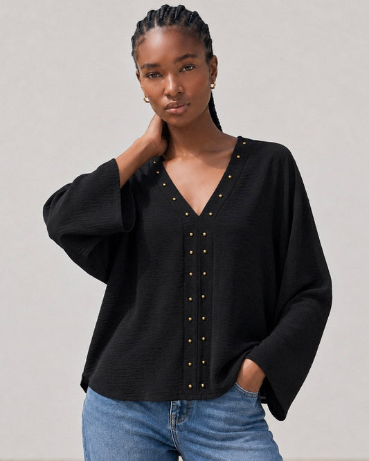 Blusa tachas negra