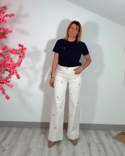 Jeans bolsillos bordado