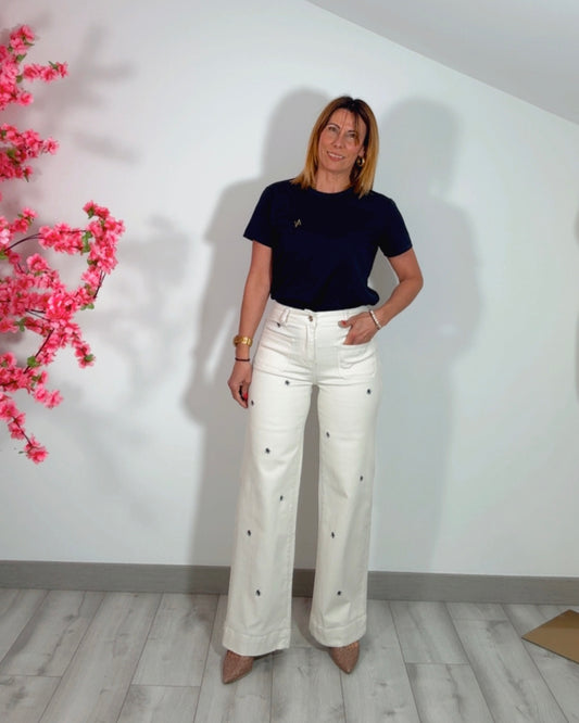 Jeans bolsillos bordado