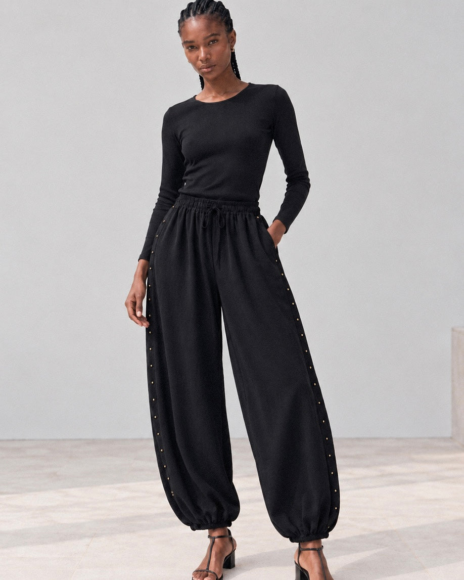 Pantalon bombacho tachas